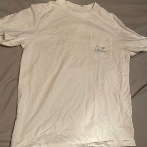This shirt is made by vineyard vines and is white